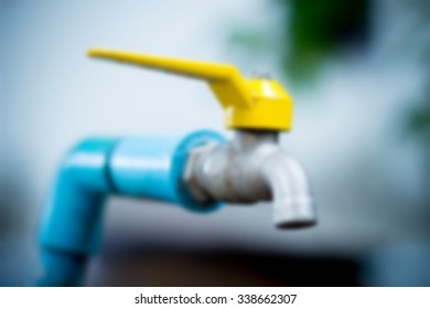 Blur of water faucet