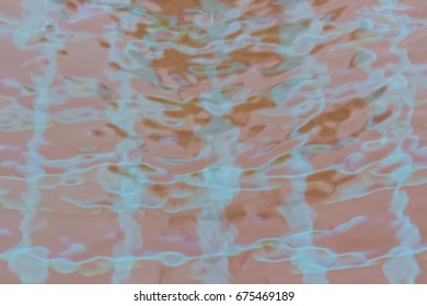 Blur of water reflection in the pool background