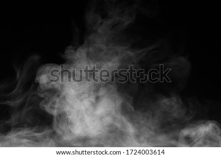 Blur white water vapour on isolated black background. Abstract of steam with copy space. Steam flow. Smoke on white background.