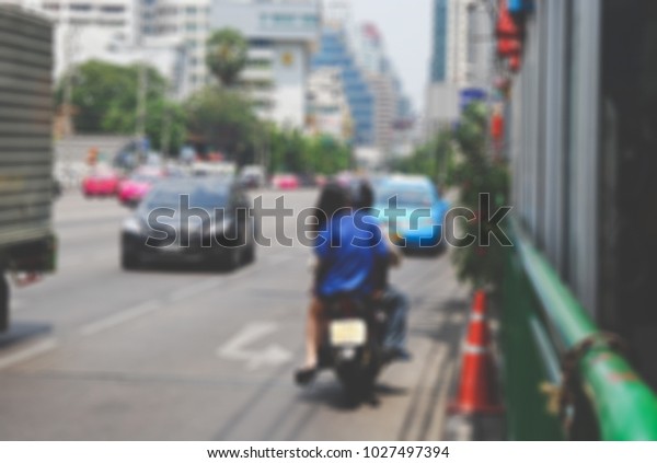 blure\
image motocycle breaking traffic rule in\
thailand