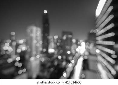 Blure Modern Building At Night. Traffic In The Business District The Skytrain Station Chong Nonsi  In Black And White, MahaNakhon 