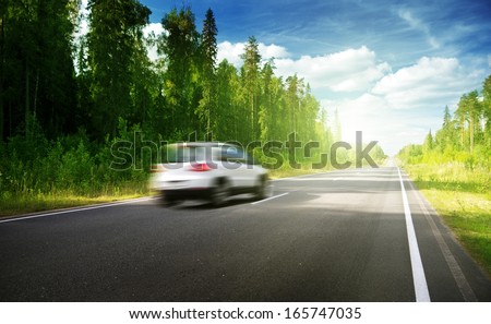 blured car on  road 