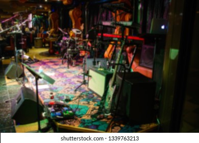 Blured Image Of Small Band Stage On A Cruise Ship Liner Promenade  