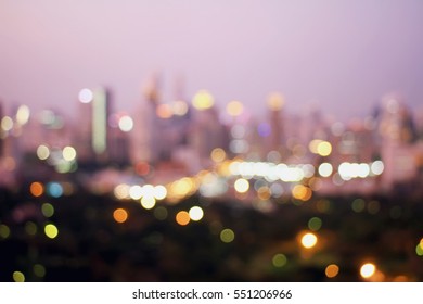 Blured Lights Of Building, Blur City Skyline With Urban Skyscrapers At Night, Downtown Buildings For Background.