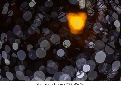 Blured Yellow Street Lamp In Grey Spots At Night