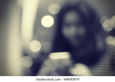 Blurred abstract background and can be illustration to article of Woman using a smart phone - Shutterstock ID 549093979