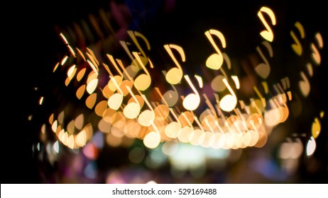 Blurred Abstract Background Christmas Light With Music Note Bokeh