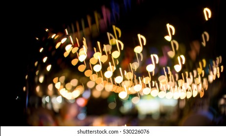 Blurred Abstract Background Christmas Light With Music Note Bokeh