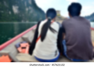 Blurred abstract background of couple travel on boat - Shutterstock ID 457621132