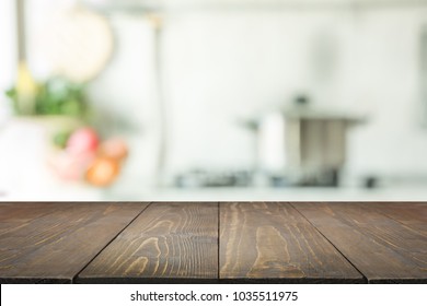 Blurred abstract background. Modern kitchen with tabletop and space for you.