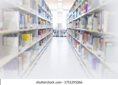 Blurred Abstract Background Of Modern Public Library Interior With Book Shelves.