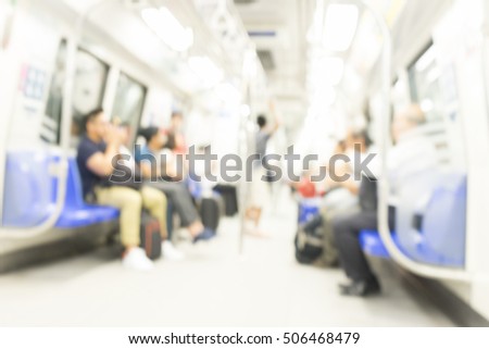 Blurred abstract background of people on subway train