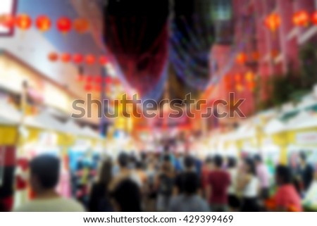 Blurred abstract background of People walking tour festival