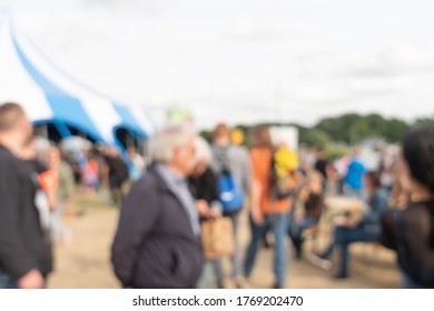 Blurred Abstract Background Of Summer Festival Europe With Outdoor Music Concert Street Food Truck After Coronavirus Pandemic Event Arrange Crowd People Safety Hygiene Social Distancing New Normal