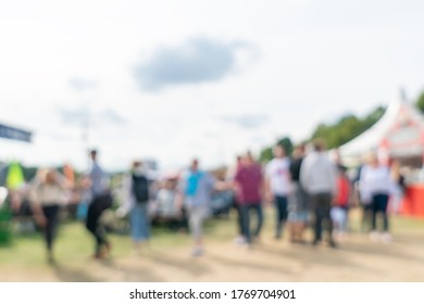 Blurred Abstract Background Of Summer Festival Europe With Outdoor Music Concert Street Food Truck After Coronavirus Pandemic Event Arrange Crowd People Safety Hygiene Social Distancing New Normal