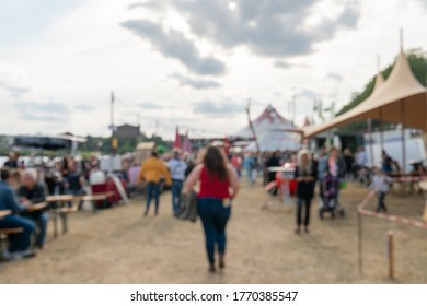 Blurred Abstract Background Of Summer Festival Europe With Outdoor Music Concert Street Food Truck After Coronavirus Pandemic Event Arrange Crowd People Safety Hygiene Social Distancing New Normal