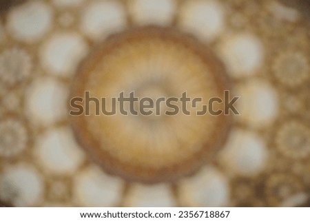 blurred abstract background of symmetrical pattern for textile, ceramic tiles and design