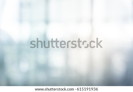 Blurred abstract glass wall building background.