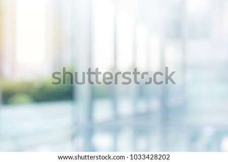 Blurred abstract  grey glass wall from building background.