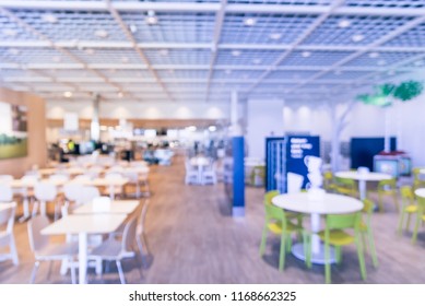 Blurred Abstract Huge Cafeteria, Restaurant, Canteen, Food Court At Shopping Mall Or Corporate In Texas, America. Defocused Modern Public Dining Area For Background Use