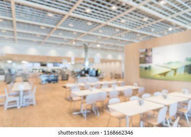 Blurred Abstract Huge Cafeteria, Restaurant, Canteen, Food Court At Shopping Mall Or Corporate In Texas, America. Defocused Modern Public Dining Area For Background Use