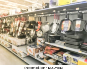 Blurred Abstract Skillet And Frying Pants On Display At Cookware Department In American Retail Store