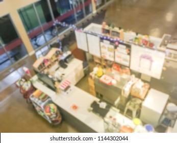 Blurred Abstract Top Down View Compact Juice Bar And Café In US Shopping Mall. Blurry Food Kiosk Booth Counter.