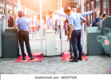 Blurred Airport Security Check At Gates With Metal Detector And Scanner