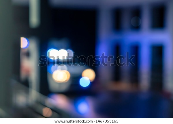 Blurred ambulance car light bokeh in the emergency\
case, accident plan