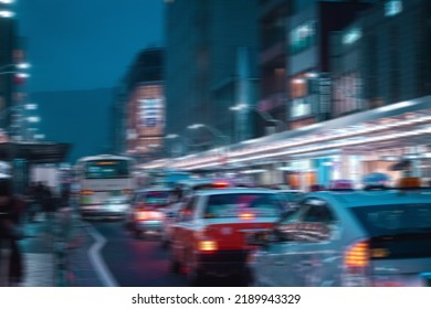 Blurred Asian City Scape With Cars In Traffic