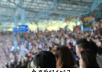 A Blurred Asian Crowd In A Stadium 