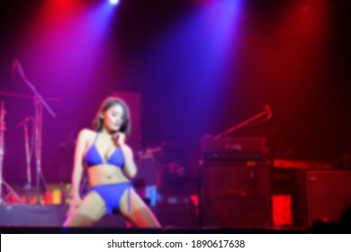 blurred Asian sexy woman show dancing on stage