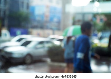 Blurred  background abstract and can be illustration to article of People walking on the rain