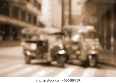 Blurred  background abstract and can be illustration to article of threewheeler classic motorised tuk-tuk taxi in Bangkok, Thailand - Shutterstock ID 566689759