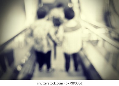 Blurred  background abstract and can be illustration to article of people on escalator