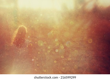 Blurred Background Back View Of Young Woman Standing In The Forest Looking Ahead And Enjoying Nature. 