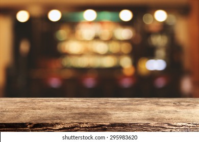 Blurred Background Of Bar And Dark Brown Desk Space Of Retro Wood 