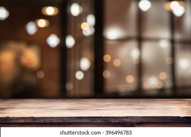 blurred background of bar and dark brown desk space of retro wood - Shutterstock ID 396496783