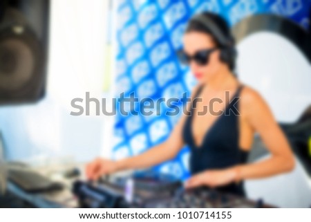 Similar – woman sitting with mixing table, in the terrace