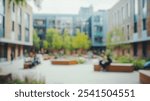 Blurred background of a beautiful university courtyard in the united kingdom, featuring lush greenery and modern architecture, providing a serene space for students to relax and study.