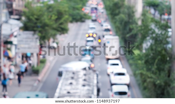 Blurred background : Blur of car with bokeh in\
Bangkok, Thailand