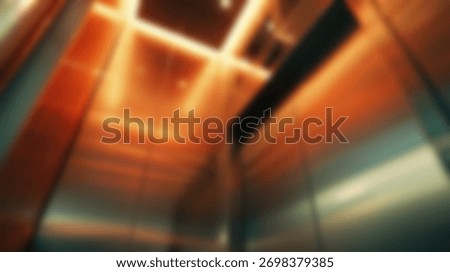 blurred background. Blurry image of an elevator inside a building.