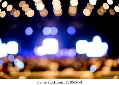 Blurred Background : Bokeh Lighting In Concert With Audience ,Music Showbiz Concept