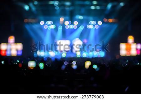 Blurred background : Bokeh lighting in concert with audience ,Music showbiz concept.