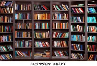 Blurred Background. Bookshelf In Public Library