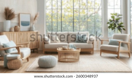 Blurred background of bright and airy scandinavian living room featuring natural light, stylish furniture, and a serene atmosphere. perfect for modern home decor inspiration.