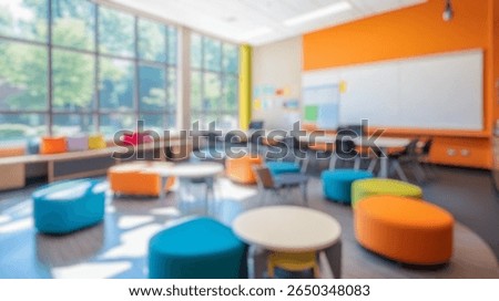 Blurred background of a bright and inviting elementary school classroom featuring colorful furniture and large windows creating a vibrant learning environment for children.