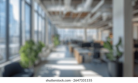 Blurred background of bright and modern office space with abundant natural light, open floor plan, lush greenery, and a contemporary design aesthetic for productive work environment