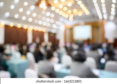 Blurred Background Of Business People In Conference Hall Or Seminar Room.