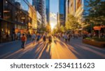 Blurred background of a bustling city street during the golden hour captures the warm light casting long shadows as people enjoy their evening stroll among high-rise buildings and trees.